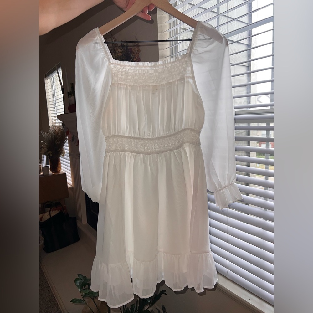 White sheet sleeved dress